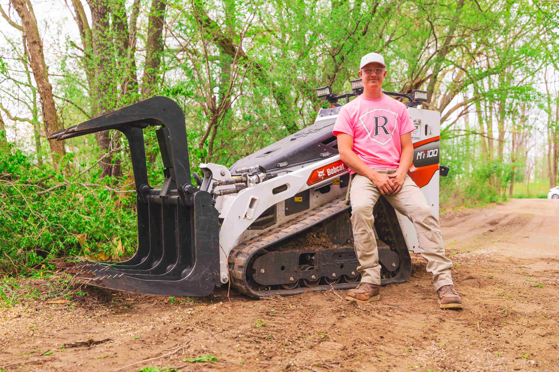 Dalton Rasmussen, owner of Rasmussen Landscaping, with a Bobcat MT100 track loader
